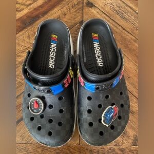 CROCS Kids Black Clogs with Blue and Red Accents